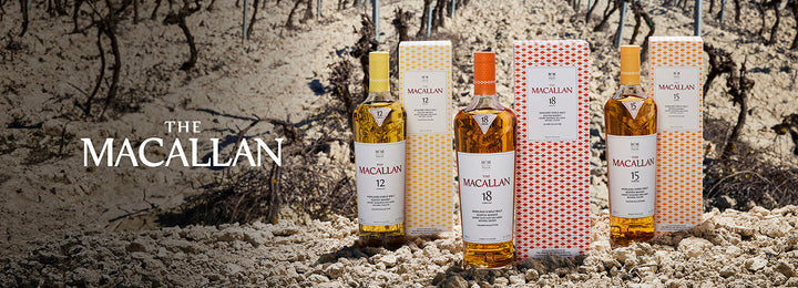 Macallan whisky bottles with differently coloured boxes