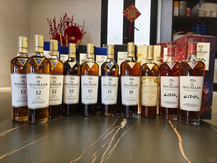 A selection of Macallan whisky bottles on a table