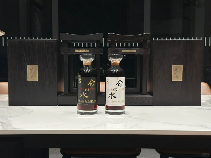 Two Karuizawa bottles and wooden cases