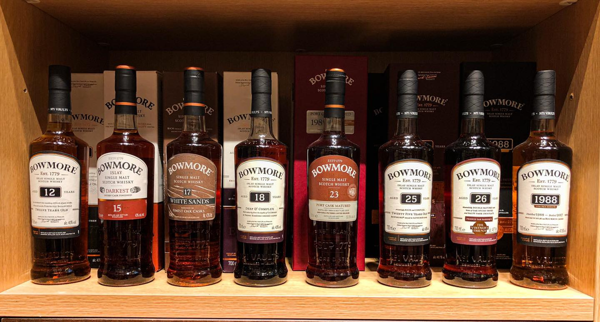Bowmore Islay whisky bottles with vintage and special-edition boxes