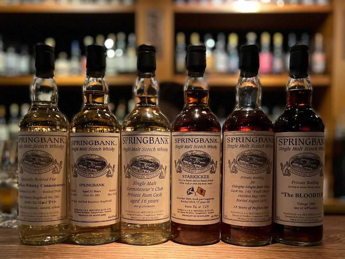 Springbank whisky bottles with older labels and original boxes